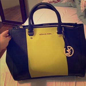 Large black and lime green Michael Kors purse